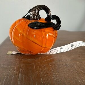 Small black and orange glass pumpkin